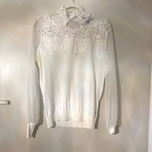 White sheer sleeve sweater.